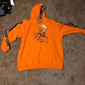 Legendary orange pull over hoodie